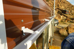 Adding An Amerimax Vinyl Gutter To Our Carolina Carport Facade Sample for How To Put Gutters On A Metal Carport